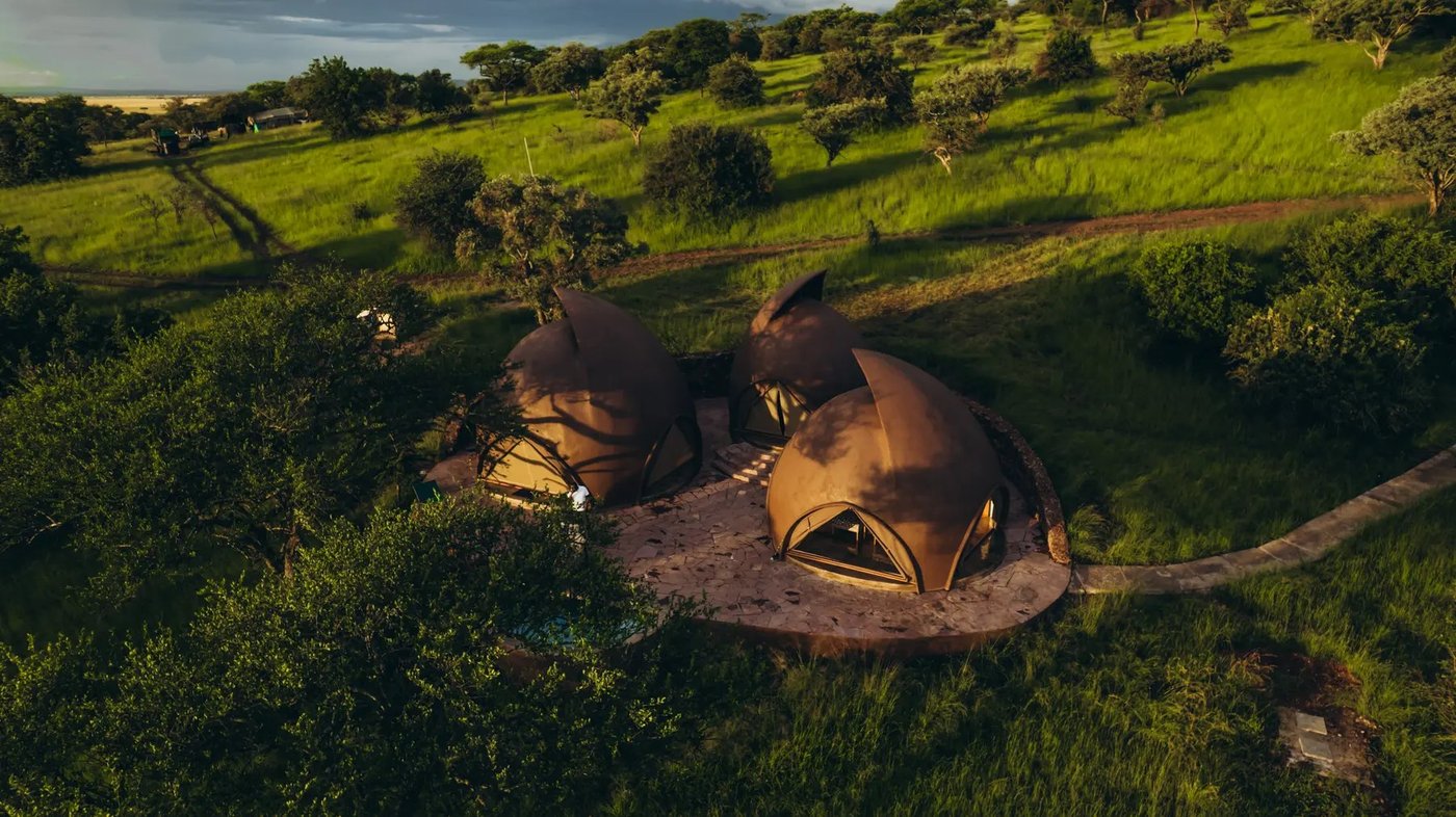 Aerial view of dome tents set in open bushland at Asanja Ruaha